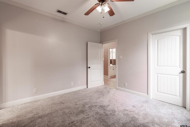 12260 Jazmin Cir, Flint, TX 75762 - kitchen featuring appliances with stainless steel finishes, arched walkways, ornamental molding, white cabinetry, and a center island