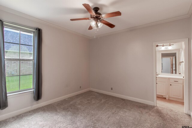 12260 Jazmin Cir, Flint, TX 75762 - kitchen with stainless steel appliances, a sink, crown molding, dark stone countertops, and tasteful backsplash