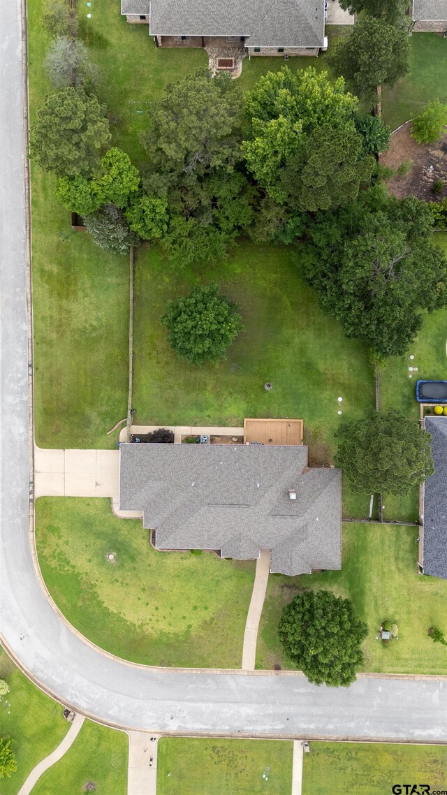 12260 Jazmin Cir, Flint, TX 75762 - empty room with light carpet, lofted ceiling, baseboards, and ceiling fan