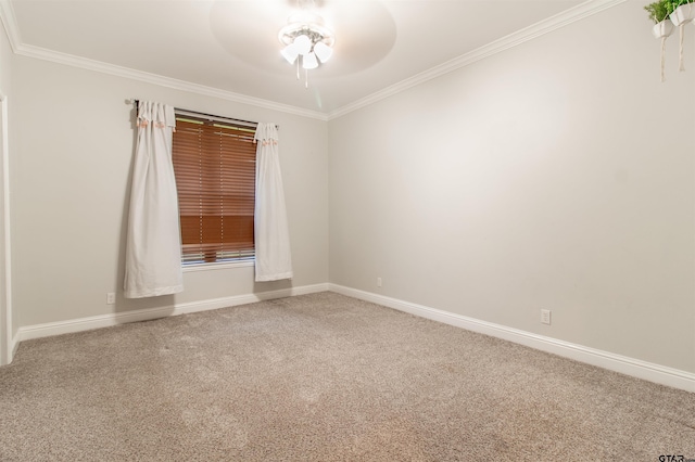 unfurnished room with ornamental molding, ceiling fan, and carpet flooring