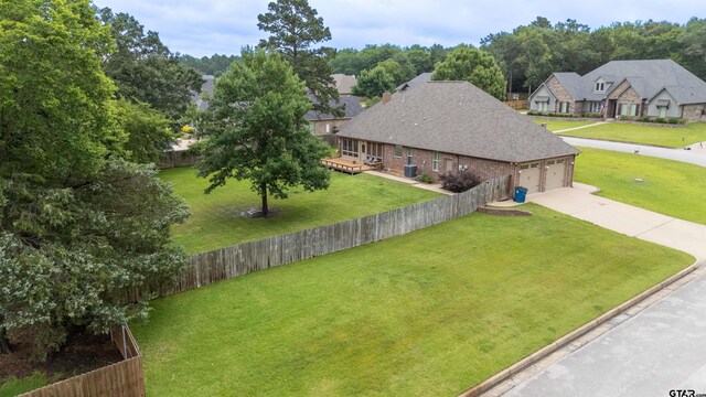 12260 Jazmin Cir, Flint, TX 75762 - carpeted spare room with a raised ceiling, plenty of natural light, ornamental molding, and a barn door