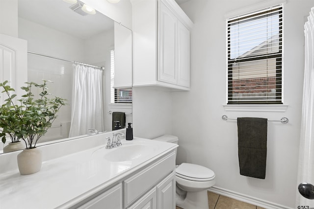 bathroom with tile patterned flooring, vanity, toilet, a shower with curtain, and visible vents