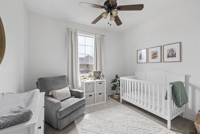 bedroom featuring baseboards, carpet, and a ceiling fan