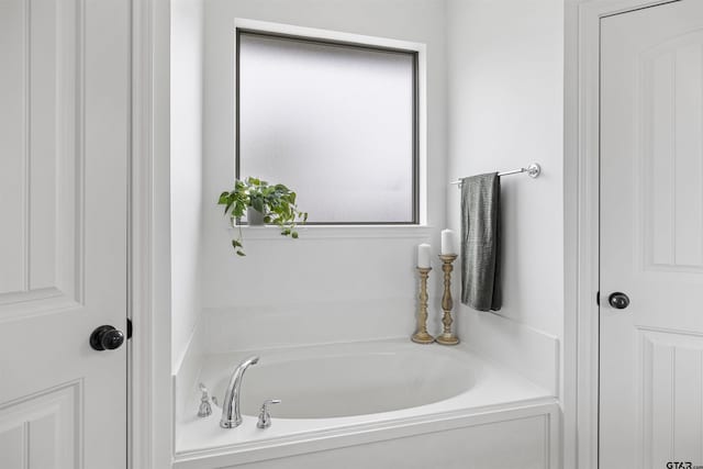 bathroom featuring a bath