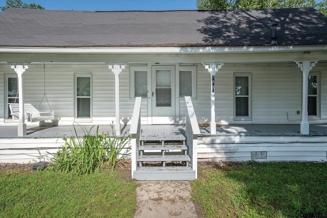 1498 Fm 279, Ben Wheeler, TX 75754 - property entrance featuring a porch and roof with shingles