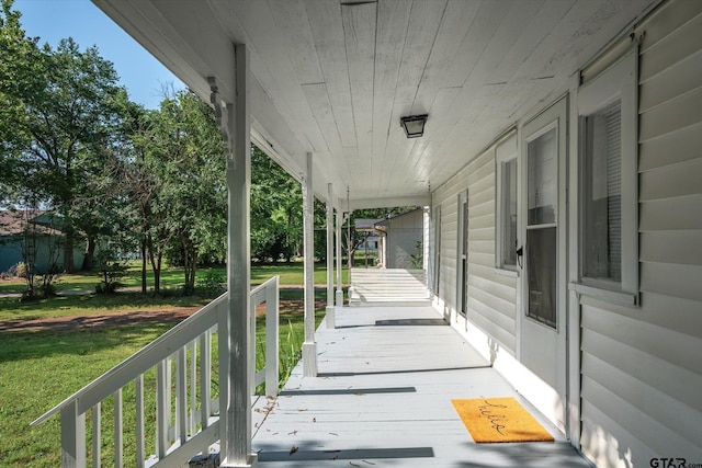 1498 Fm 279, Ben Wheeler, TX 75754 - wooden porch with a yard
