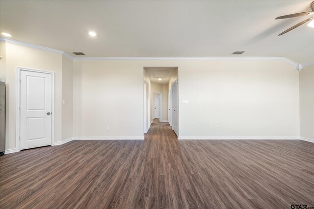 empty room with ornamental molding, ceiling fan, and dark wood-type flooring