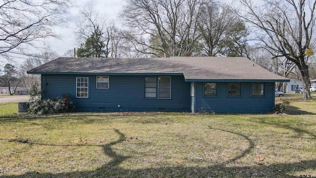 view of front of property with crawl space, central AC unit, and a front yard