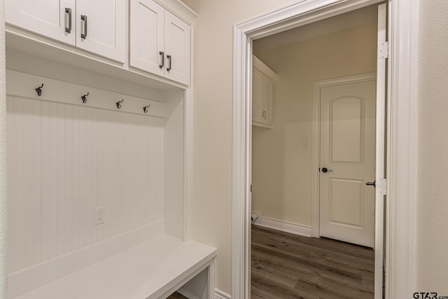 mudroom with dark hardwood / wood-style floors