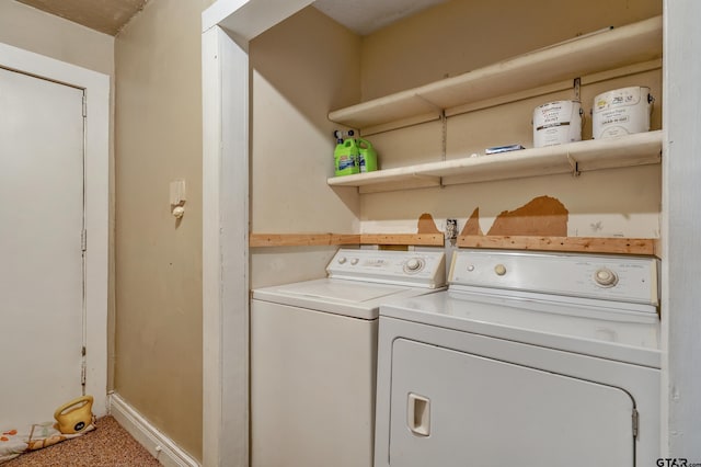 washroom featuring washing machine and dryer