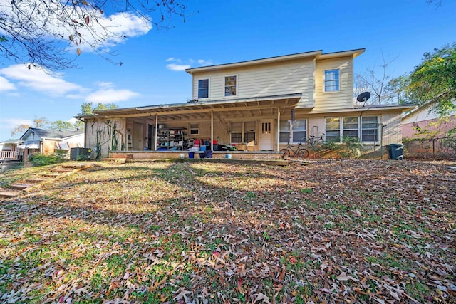 rear view of property featuring a patio area