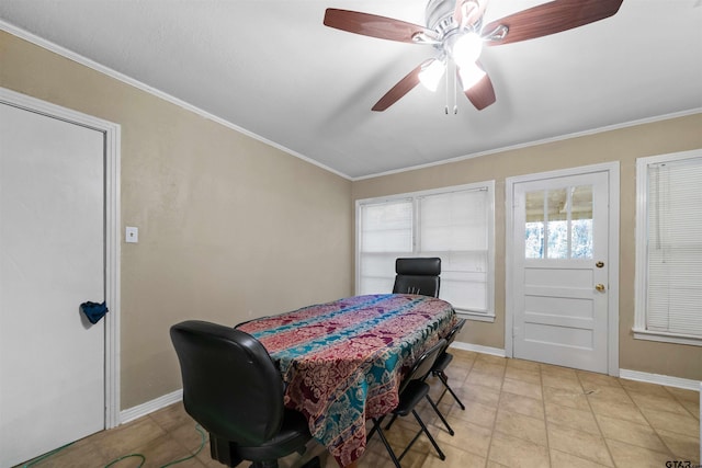 dining space featuring ceiling fan and crown molding