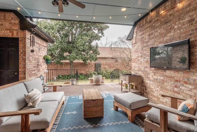 view of patio / terrace featuring an outdoor living space and ceiling fan