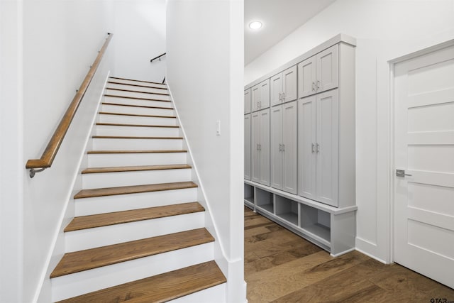 4645 Cascades Blvd, Tyler, TX 75709 - stairs featuring wood finished floors, recessed lighting, and baseboards
