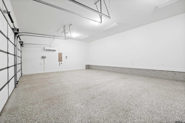 4645 Cascades Blvd, Tyler, TX 75709 - garage featuring electric panel, baseboards, and an AC wall unit