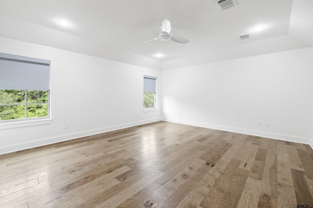 4645 Cascades Blvd, Tyler, TX 75709 - spare room with wood finished floors, a ceiling fan, baseboards, and recessed lighting