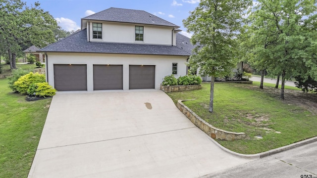 4645 Cascades Blvd, Tyler, TX 75709 - view of front of house with stucco siding, concrete driveway, a front lawn, an attached garage, and a shingled roof