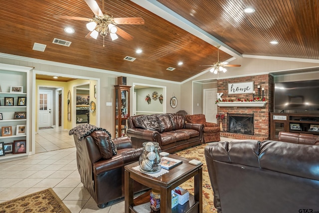 13094 Fm 2010, Chandler, TX 75758 - living area with a ceiling fan, light tile patterned floors, crown molding, wooden ceiling, and a fireplace