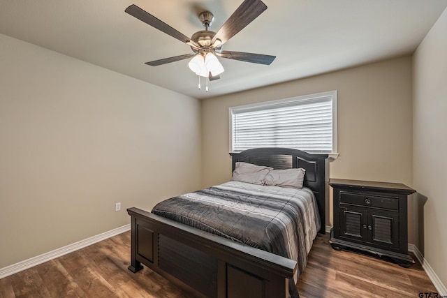 13094 Fm 2010, Chandler, TX 75758 - bedroom with baseboards, wood finished floors, and a ceiling fan