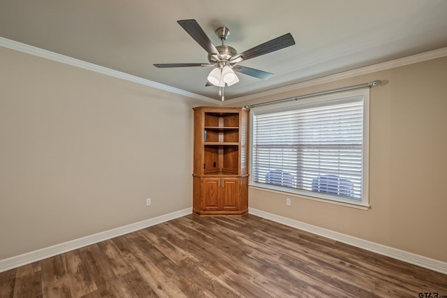 13094 Fm 2010, Chandler, TX 75758 - unfurnished room with baseboards, dark wood finished floors, ornamental molding, and ceiling fan