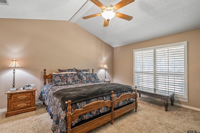 13094 Fm 2010, Chandler, TX 75758 - bedroom with vaulted ceiling, light colored carpet, baseboards, a ceiling fan, and a textured ceiling