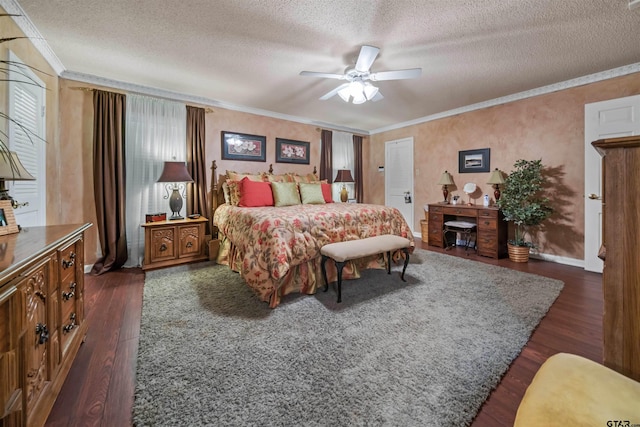 bedroom with multiple windows, a textured ceiling, dark hardwood / wood-style floors, and ceiling fan