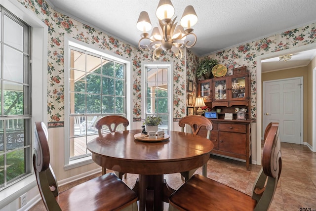 tiled dining room featuring crown molding, a textured ceiling, and a chandelier