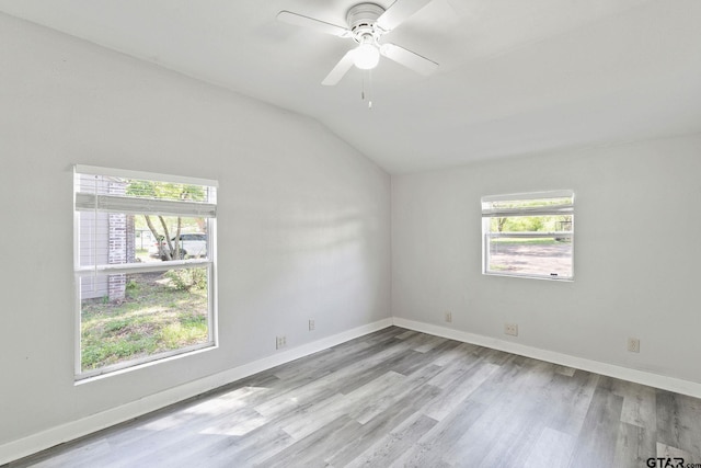 616 Arizona Ave, Wake Village, TX 75501 - empty room featuring wood finished floors, ceiling fan, baseboards, and vaulted ceiling