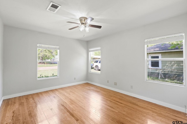 616 Arizona Ave, Wake Village, TX 75501 - unfurnished room with visible vents, baseboards, a ceiling fan, and light wood-style floors