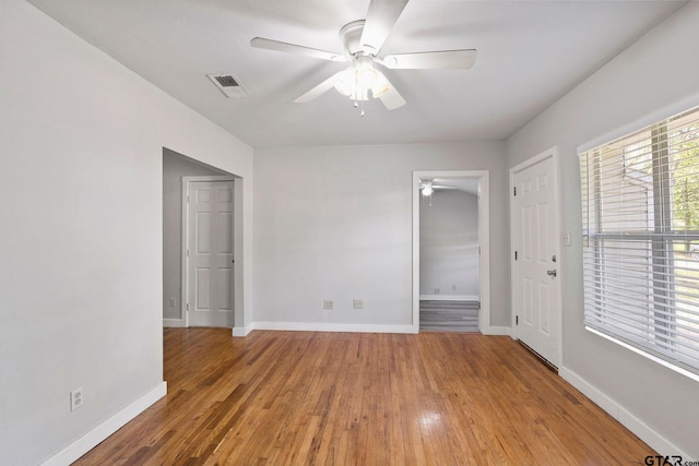 616 Arizona Ave, Wake Village, TX 75501 - empty room featuring baseboards, light wood-style flooring, visible vents, and a ceiling fan