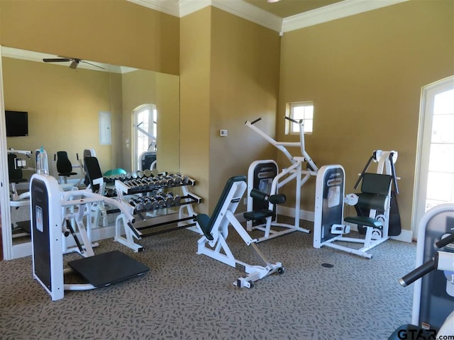 954 La Vista Dr, Tyler, TX 75703 - gym featuring a ceiling fan, crown molding, baseboards, plenty of natural light, and carpet floors