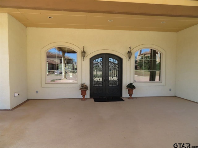 954 La Vista Dr, Tyler, TX 75703 - property entrance with french doors and stucco siding