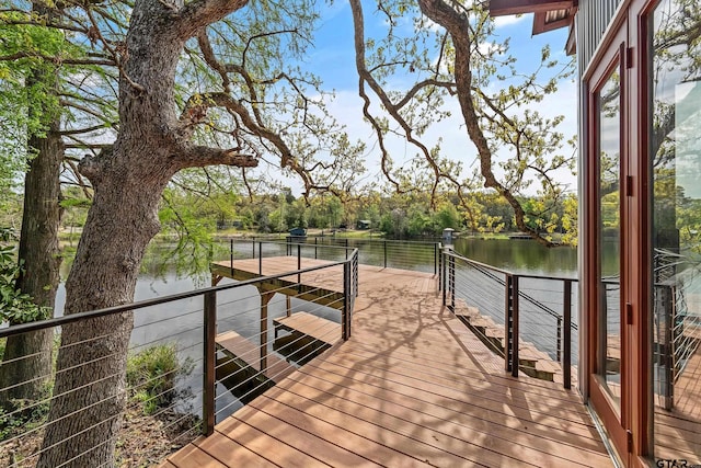 dock area with a water view