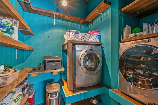 laundry area featuring washer / clothes dryer and laundry area