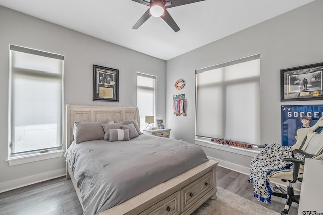 14611 Twin Pines Ln, Lindale, TX 75771 - bedroom featuring multiple windows, wood finished floors, and ceiling fan
