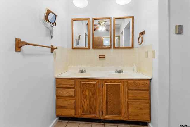 bathroom featuring vanity, backsplash, tile patterned floors, and ceiling fan