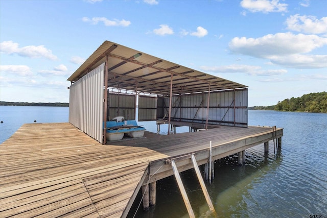 dock area featuring a water view