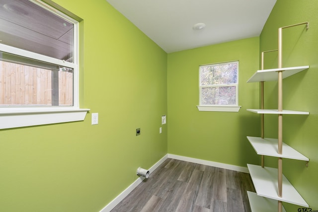 washroom featuring hookup for an electric dryer and wood-type flooring