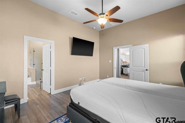 bedroom featuring ceiling fan and light hardwood / wood-style flooring