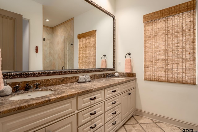 bathroom with vanity and an enclosed shower