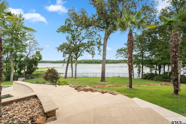 view of patio / terrace with a water view