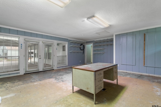 basement with a textured ceiling