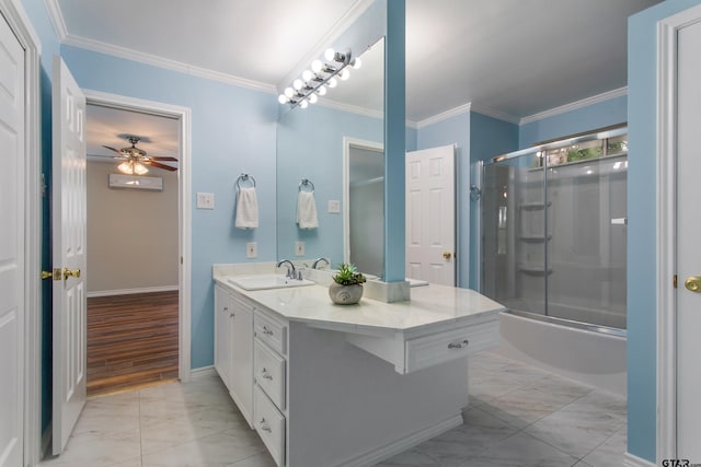 bathroom with vanity, ornamental molding, a ceiling fan, and marble finish floor