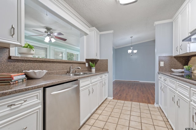 kitchen featuring dishwasher, a sink, ceiling fan with notable chandelier, ornamental molding, and light tile patterned flooring