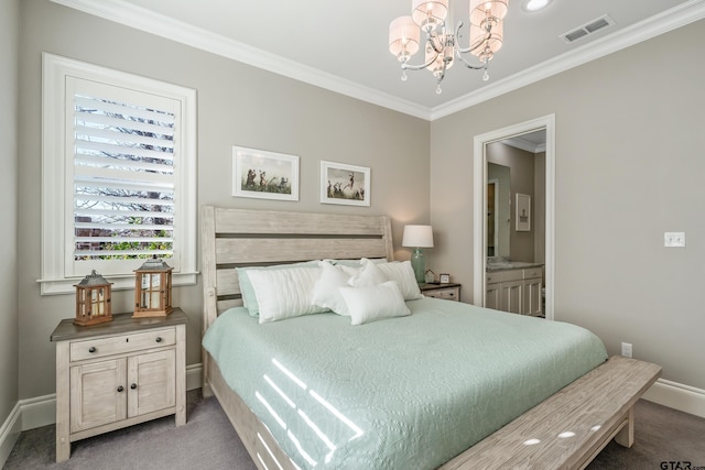 carpeted bedroom with a notable chandelier, visible vents, baseboards, ensuite bath, and crown molding