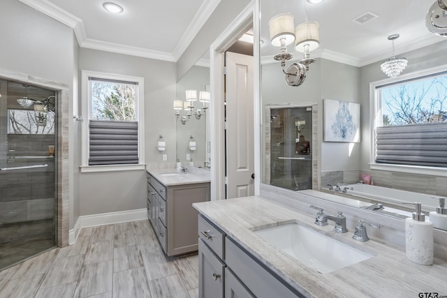 full bath with a chandelier, a stall shower, a sink, and crown molding