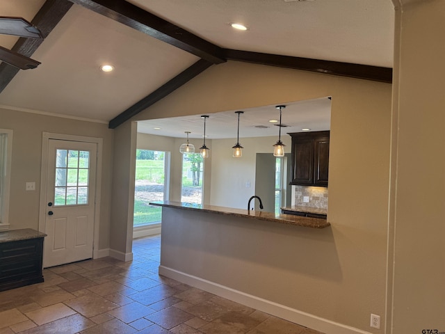 8856 Pleasant Hill Cir, Tyler, TX 75707 - kitchen featuring baseboards, recessed lighting, dark brown cabinets, and stone tile flooring