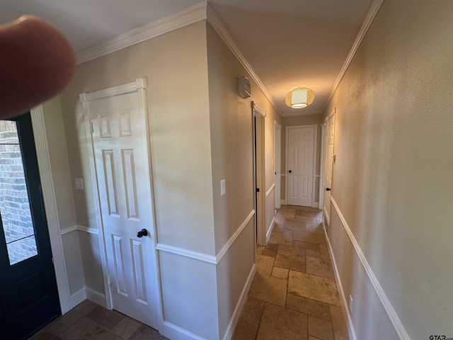 8856 Pleasant Hill Cir, Tyler, TX 75707 - corridor with baseboards, stone tile flooring, and crown molding