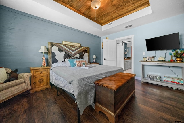 1325 Fm 23 W, Rusk, TX 75785 - bedroom featuring wood ceiling, a raised ceiling, wood finished floors, ensuite bathroom, and wood walls