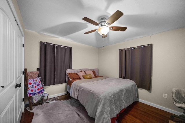 1325 Fm 23 W, Rusk, TX 75785 - bedroom with baseboards, wood finished floors, and a ceiling fan